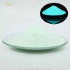 Blue green glow powder with an inset showing its glow