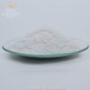Violet glow powder shown as a pale powder in daylight