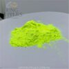 Neon yellow glow powder in daylight