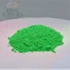 Neon green glow powder in daylight