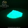 Neon blue powder glowing in the dark
