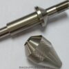 Expanding ring mandrel shaft and removable conical end