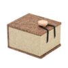 Closed burlap-covered ring box with a button-and-loop fastening