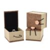 Burlap-covered ring boxes with button-and-loop fastenings
