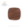 Wood grain on the closed lid of a square walnut ring box