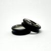 Two ebony ring blanks with stainless steel cores