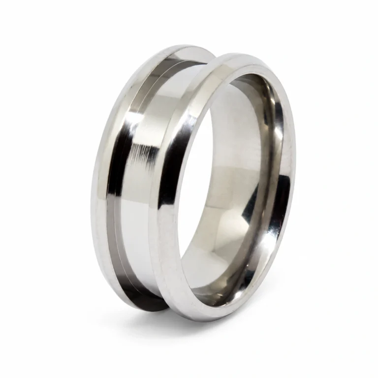 Titanium ring blank with a recessed inlay channel on a white background